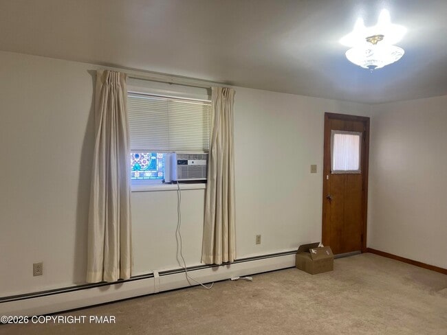 Building Photo - 144 E Diaz Ave