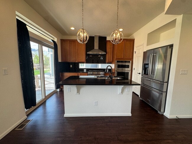 Building Photo - Luxury Corner Lot Home in Banning Lewis with Finished Basement, Wet Bar & Designer Upgrades