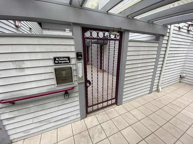 Secure gate callbox - 3435 California Ave SW