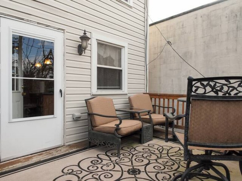 Surprisingly quiet and private back porch. - 3732 Falls Rd