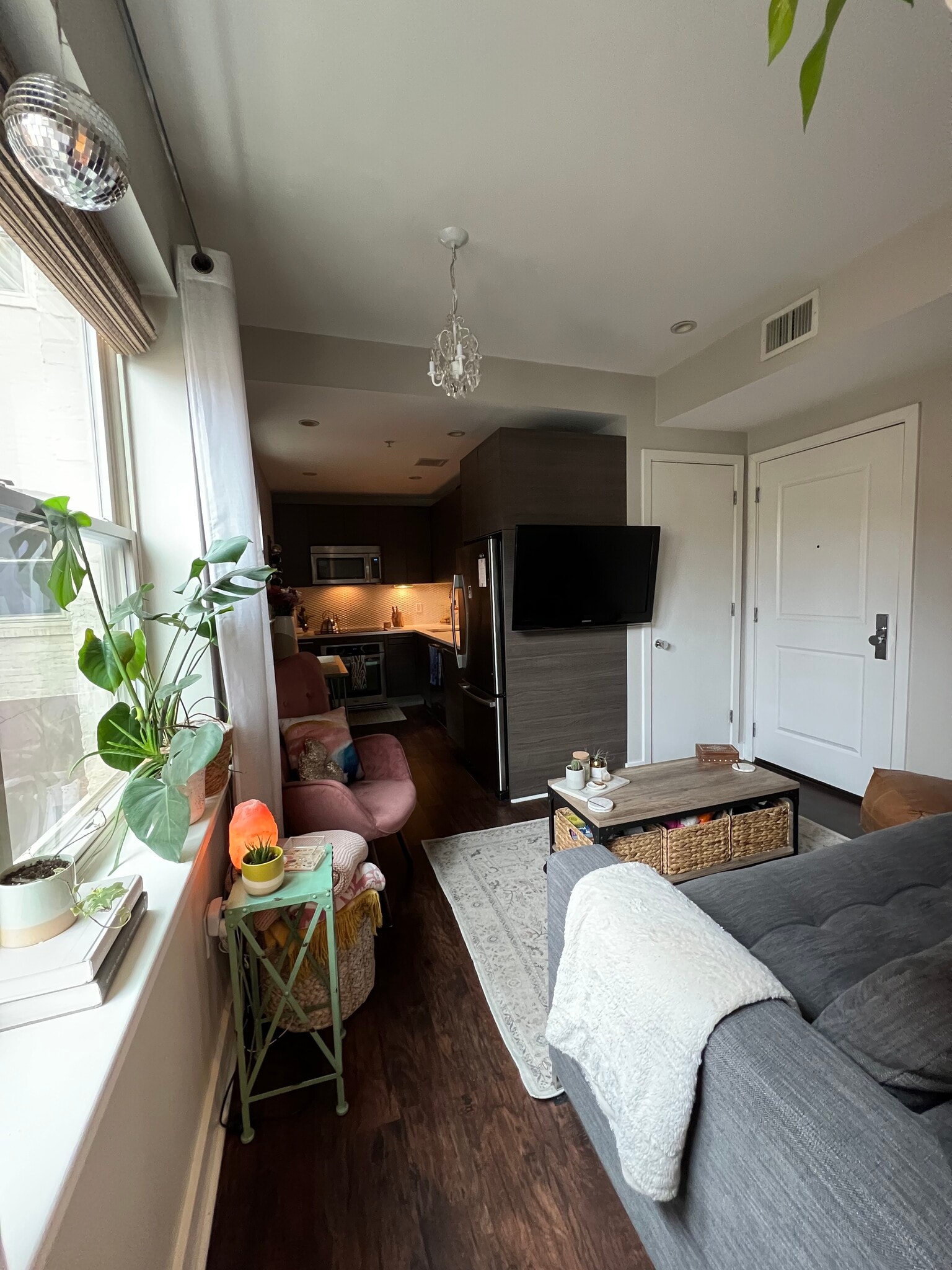 mounted TV comes with unit (rest unfurnished) - 3606 Rock Creek Church Rd NW