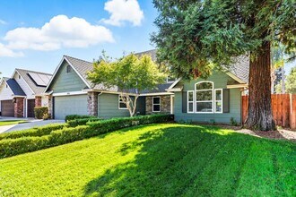 Building Photo - Spacious 5-Bedroom Home with Pool in NE Fr...