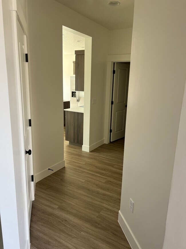 Building Photo - Newer 4 bedroom townhome in South Desert Gardens!