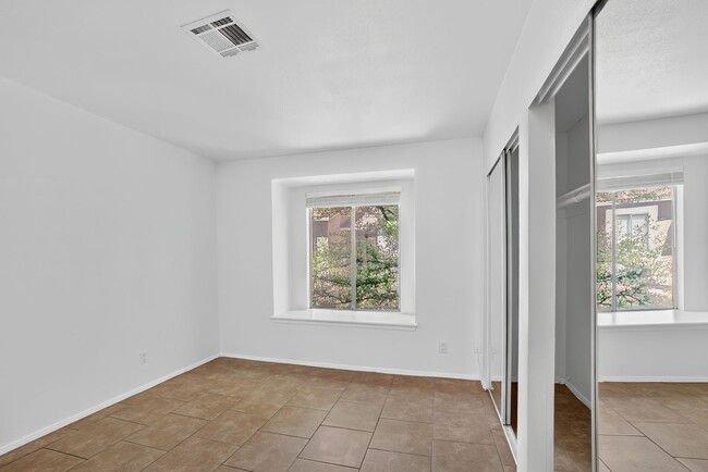 Building Photo - READY TO MOVE-IN UPPER LEVEL 2-BEDROOM CONDO!