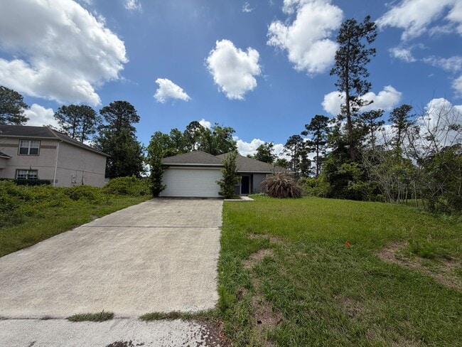 Building Photo - AWESOME 3/2 w/ office HOME in Deltona! You need to check this out!