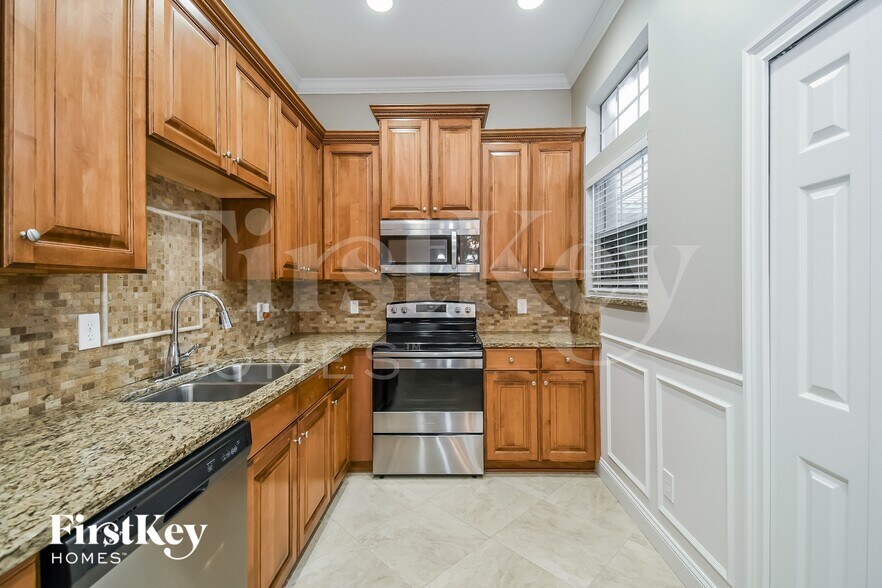 Building Photo - 12342 Carriann Cove Trail W