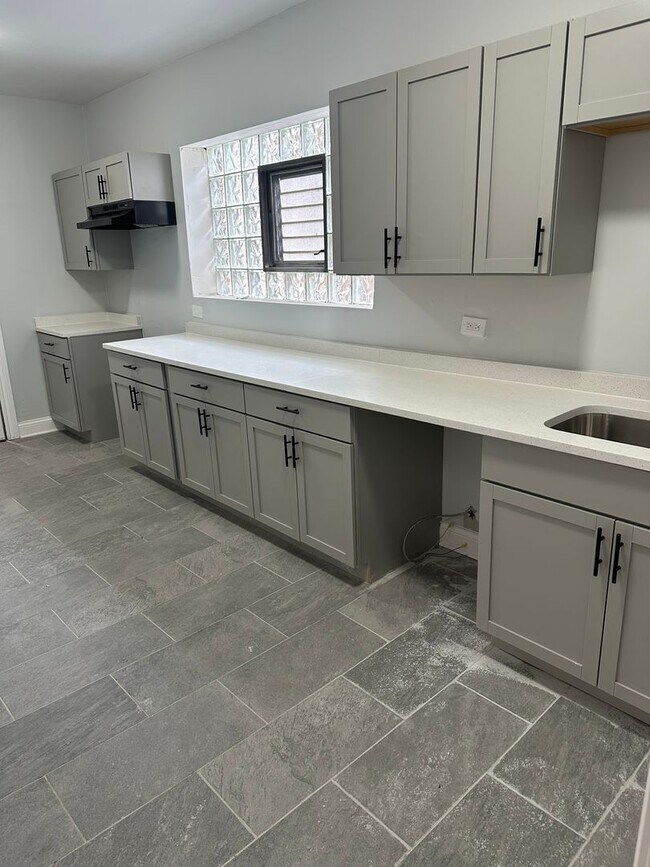 Building Photo - 8040 S Langley Ave