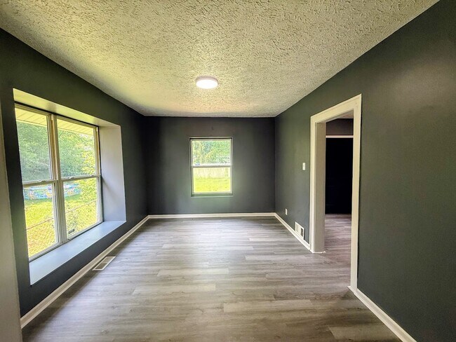 Building Photo - Three bedroom one bathroom single-family home for rent