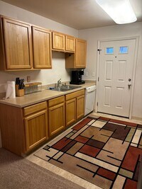 Building Photo - Move-In Ready 2BR/2BA Condo – Fully Furnis...