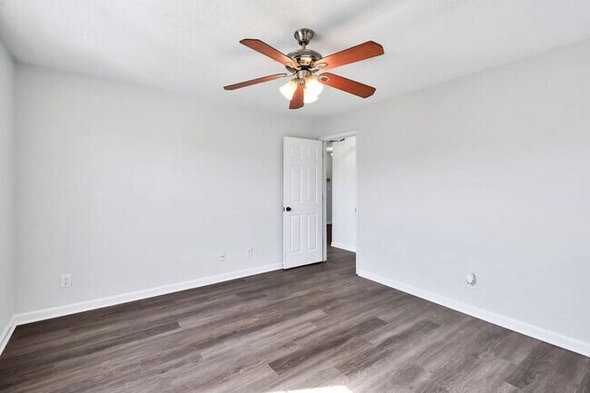 Building Photo - RENT SPECIAL! Freshly Painted! New Luxury Vinyl Plank Floors! Updated Lighting! Pool View Unit! C...