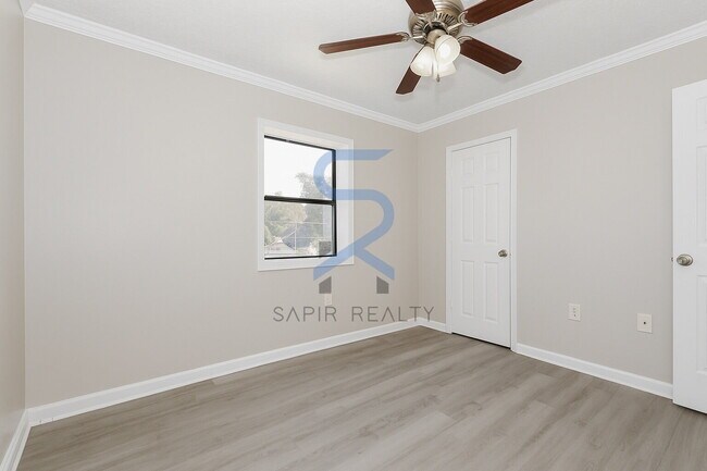 Building Photo - Move in before December 15th and choose your reward: a $250 Amazon Gift Card or a 55" Smart TV!