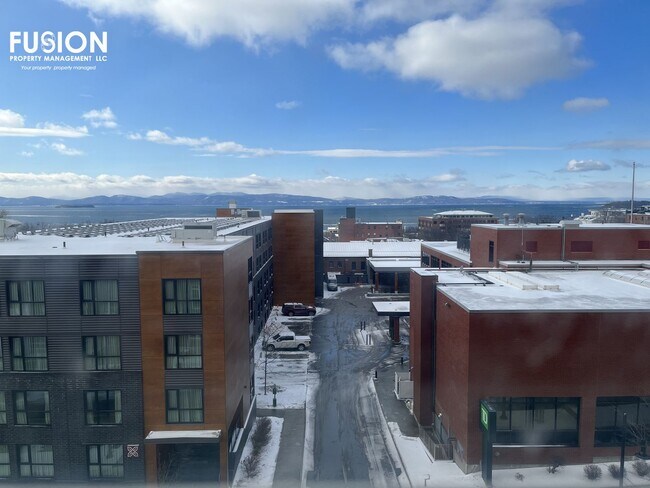 Building Photo - STUNNING LAKE VIEWS - Modern 2BR/2BA Corner Unit in The Vermont House