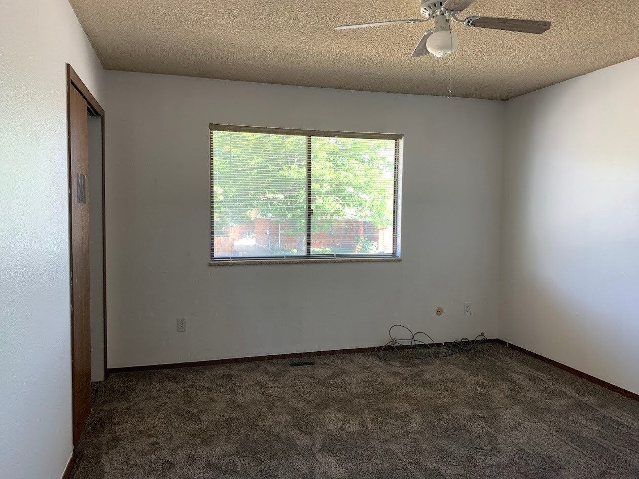 Bedroom 1 with fan - 456 Mulberry Dr