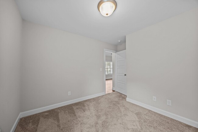 Building Photo - Three-bedroom, two-bathroom home located i...