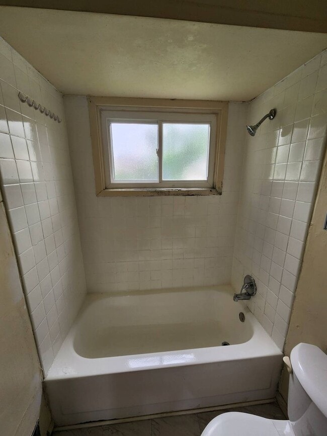 Building Photo - Move-In Special: Save $300 on This Charmin...