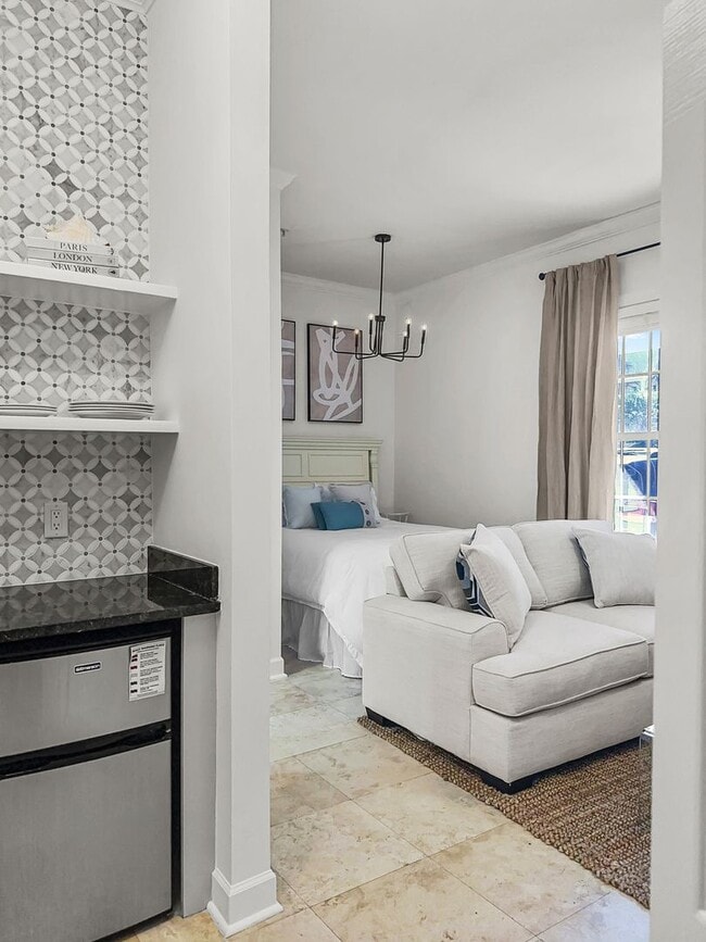 Building Photo - 50% off first months rent.  Fully furnishe...