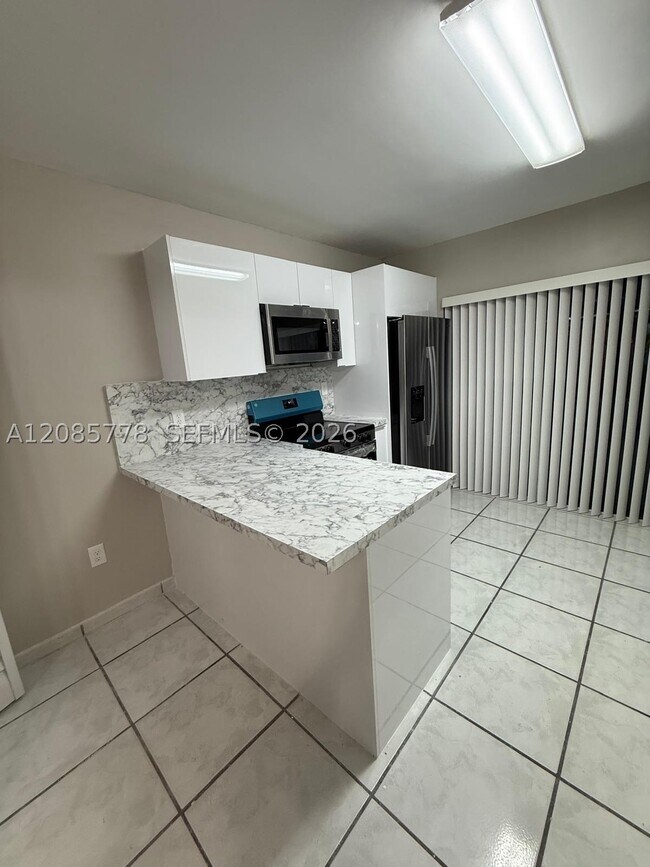 Building Photo - 7861 W 29th Way