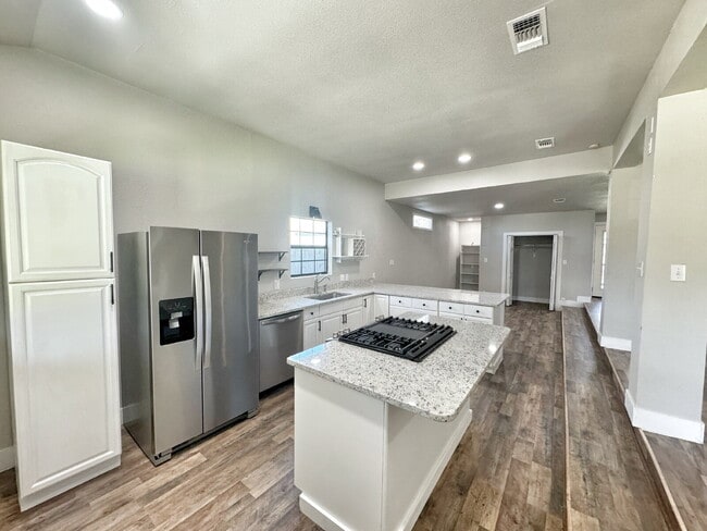 Building Photo - Move-In Special: 1 Month Rent Concession on a 14-Month Lease!