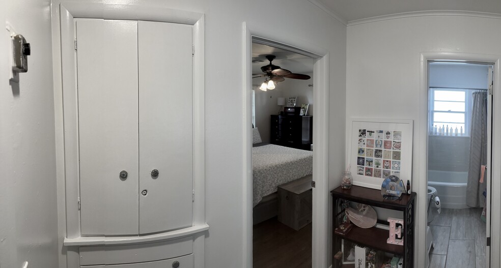 in the hallway by the master bedroom.Extra storage cabinets. - 3516 E 30th St
