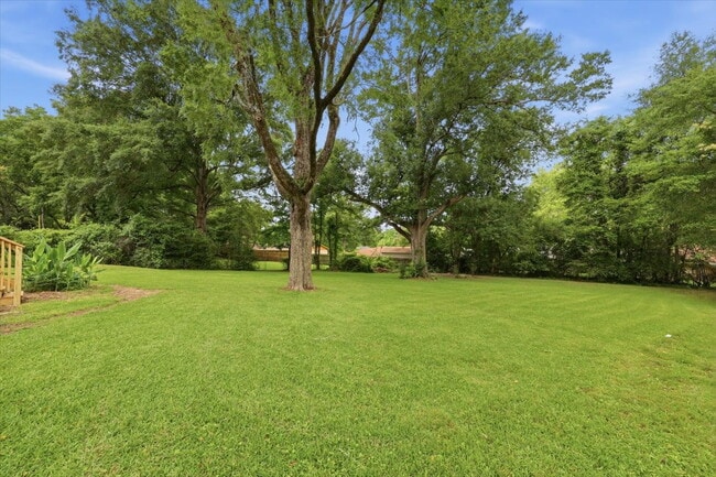 Building Photo - Spacious 4BR Home in Clinton School District with Multiple Living Areas