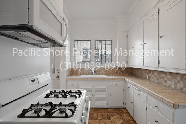 Building Photo - 8674-8674 W Olympic Blvd