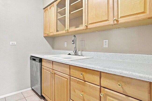 Building Photo - $1,645.95 with Half Off The First Month's Rent, 2 Beds - 1 Bath, Condo in Denver with Central A/C!