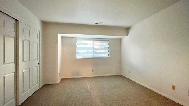 Building Photo - 2 Bedroom Condo with 2-Car Garage in Parkside Condominiums by Meadow Park