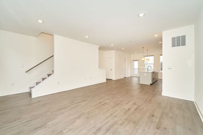 Building Photo - Like New Townhome With Your Own Rooftop Views of Downtown Indy!