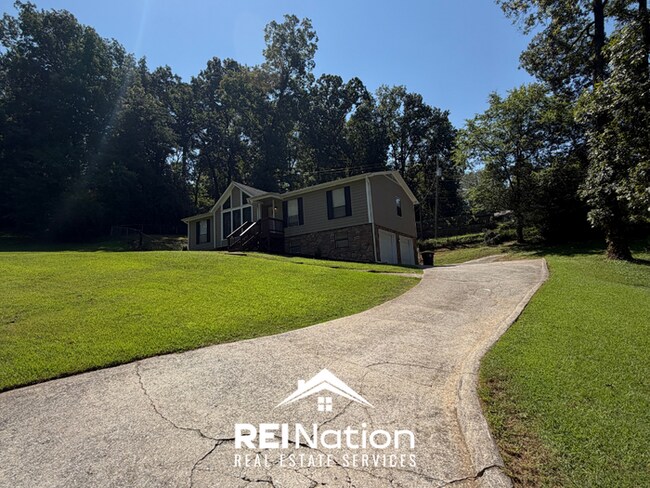 Building Photo - ACT FAST! 3BR/2BA in Birmingham | Vaulted Ceilings & Fireplace | 2-Car Garage!