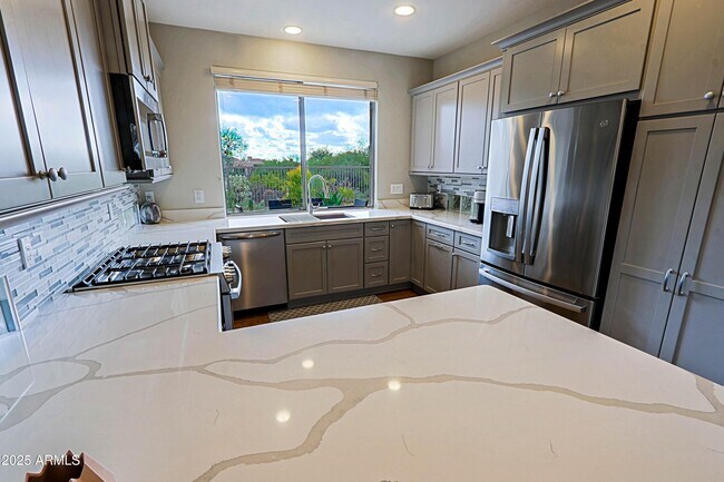 Building Photo - 6939 E Bramble Berry Ln