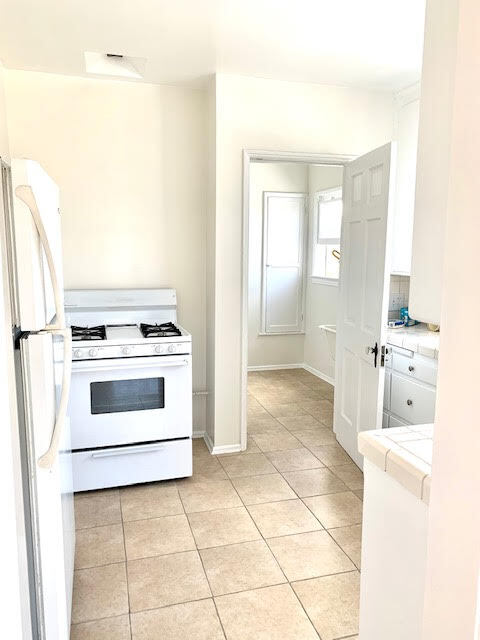 kitchen and laundry room - 356 S La Jolla Ave