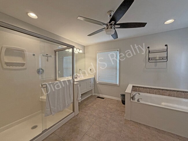 Building Photo - Stunning 3_Bed Home with Two Primary Suites & a Pool!