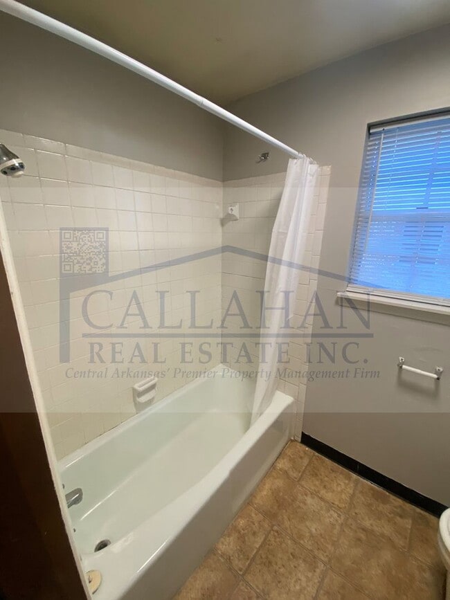 Building Photo - 8211 Woodview Dr N