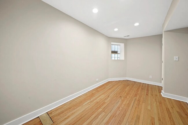 Building Photo - Spacious 2BR, 2BA Haven with Hardwood Elegance right across from Humboldt Park!