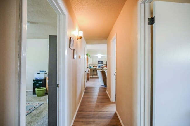 Building Photo - Three Bedroom Home with Plush Backyard