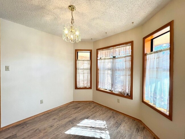 Building Photo - Available now! 3/2/2 with fenced backyard and small sunroom