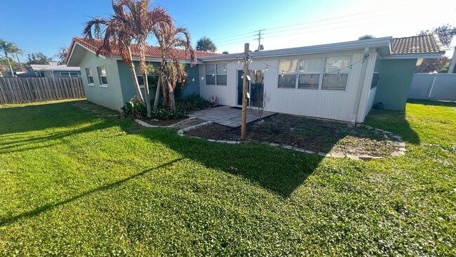Building Photo - IMMACULATE 4 Bedroom, 2 Bathroom Home in Cocoa Beach!! ONLY MINUTES from the Beach!! (Lawn Care I...