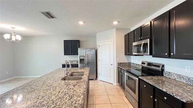 Building Photo - 2440 White Poppy Dr