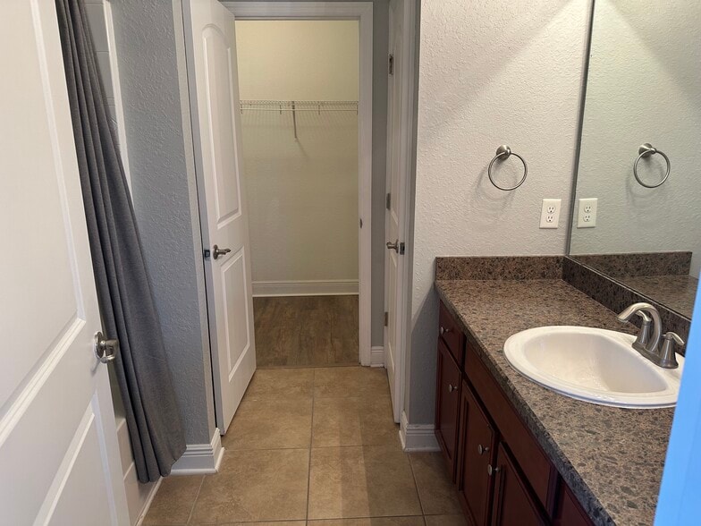 Walk in closet in master - 10727 Standing Stone Dr