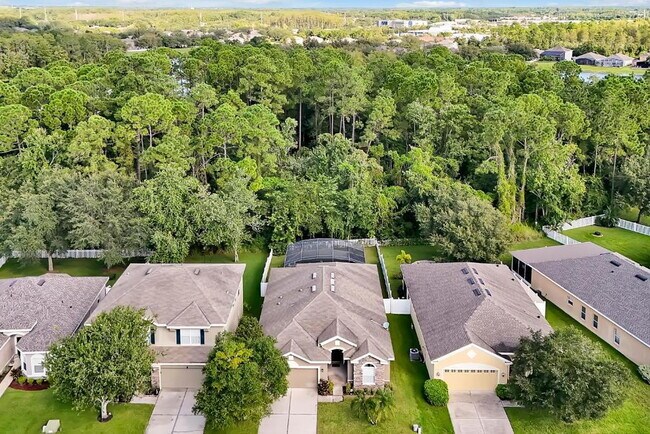 Building Photo - "Stunning 3BR Orlando Home with Private Screened Pool, Spa & Spacious Living Areas"