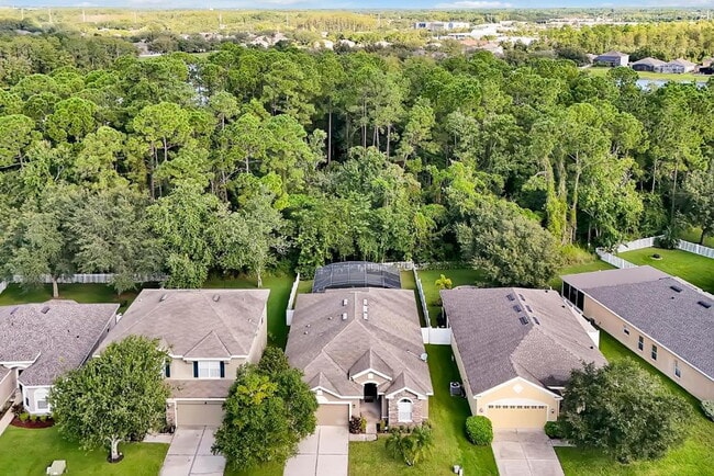 Building Photo - "Stunning Fully Furnished 3BR Orlando Home with Private Screened Pool, Spa & Spacious Living Areas"