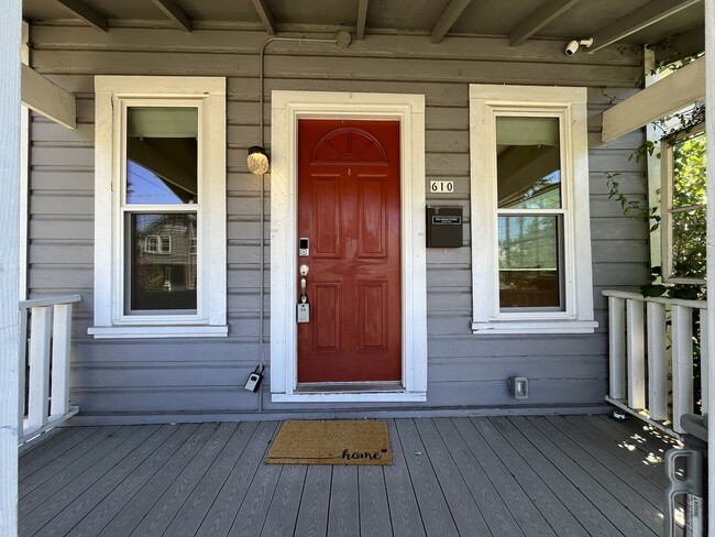 Building Photo - Charming Cottage with Hardwood Flooring, Modern Kitchen & Beautiful Outdoor Living Areas