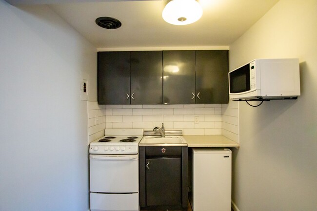 Building Photo - SW: Unique, Updated Studio w/Walk-Through ...