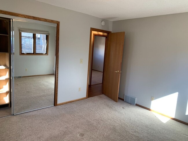 Building Photo - Elegant 4-Bedroom Split Foyer Home – West Rapid Cul-de-Sac!