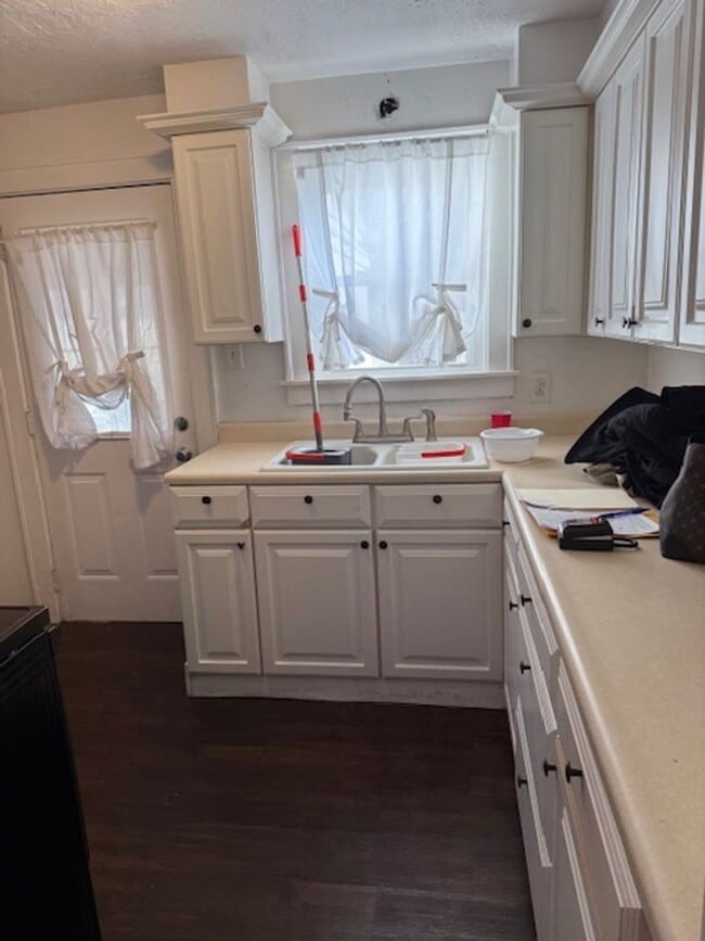 Building Photo - Make this your home 4Bedroom 2 bath home with one car garage $1550 per month