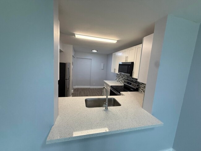 Building Photo - 7355 Woodmont Terrace