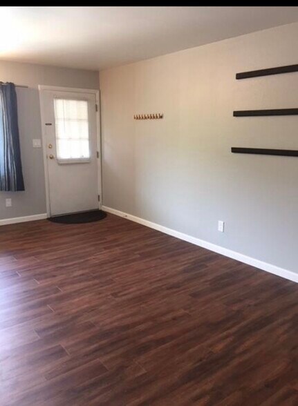 From the living room looking towards the front door - 3161 Madison Ave