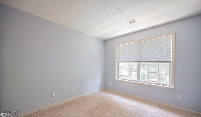 Building Photo - 12060 Carriage Park Ln