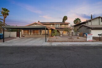 Building Photo - Welcome to your entertainers dream home with solar and pool service included!