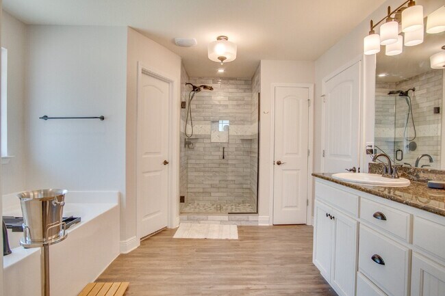 Building Photo - Milton 4BR Pool Home with Office, Vaulted Ceilings, Screened Saltwater Pool & 2-Car Garage